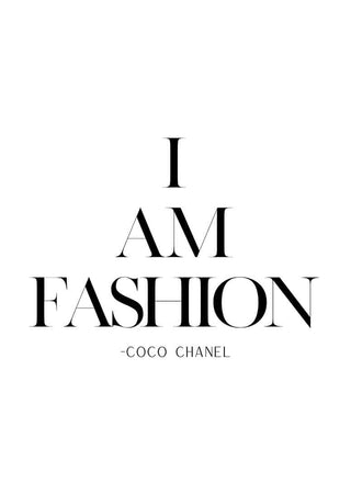 Minimalist poster with the text "I AM FASHION -COCO CHANEL" in elegant black lettering on a white background.
