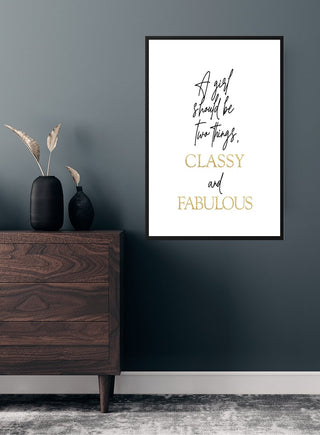 Classy and Fabulous poster displayed on a dark wall above a wooden dresser with decorative vases.