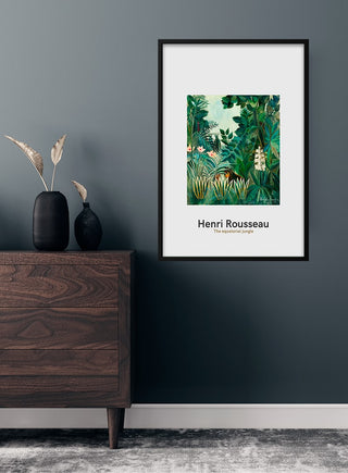Framed "The Equatorial Jungle" by Henri Rousseau japansk kunstposter hanging above a wooden dresser.