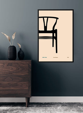 Minimalist poster of Hans Wegner's Y-chair hanging in a modern living room above a wooden dresser.