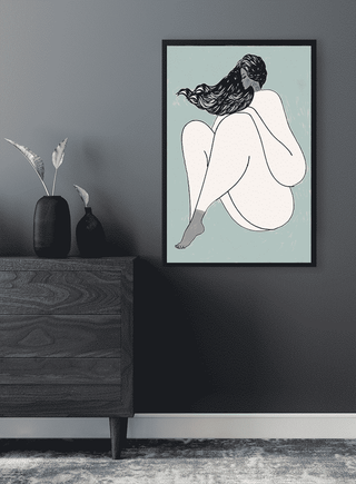 Minimalist illustration of a seated woman with long hair, displayed in a black frame on a modern interior wall.