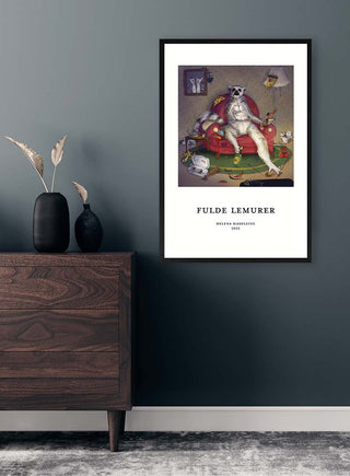 Framed Fulde Lemurer No. 03 - Helena Madeleine art print displayed on a dark wall above a wooden dresser.