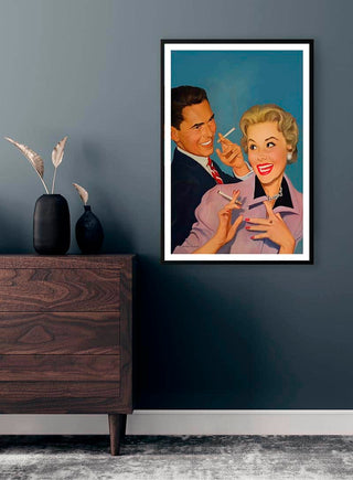 Framed "Lift me up" by Martina Karlsson displayed on a dark wall above a wooden dresser with decorative vase.