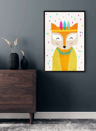 Framed artwork of a smiling fox in colorful attire and feathers, hanging above a modern wooden dresser.