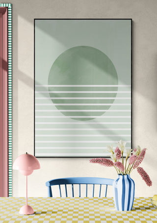 Green Horizon Lines art print with minimal sun and stripes, styled in a bright, modern dining space.