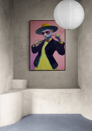 Framed Miss Cat - Martin Zen artwork on a pink background, displayed in a minimalist concrete room.
