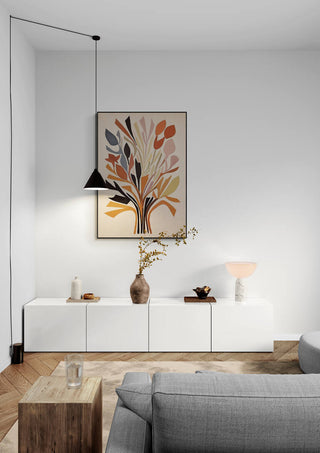 Inner Paths of Light artwork hanging above a modern white sideboard in a minimalist living room.