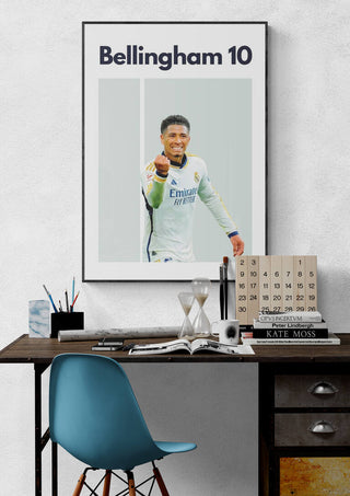 Poster of Bellingham in a Real Madrid kit with "Bellingham 10" above, displayed on a wall above a desk.