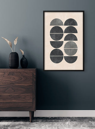 Framed Half Circles Plakat artwork hanging above a wooden dresser in a modern, minimalist room.