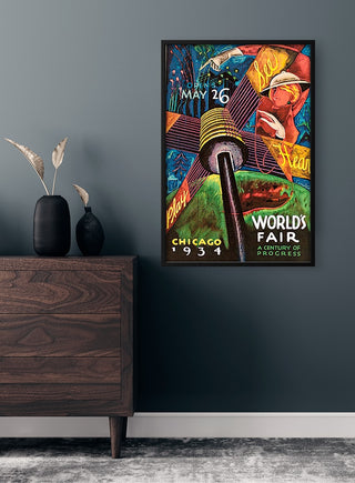 Framed vintage World’s Fair 1933 Chicago plakat displayed on a dark wall above a wooden dresser.