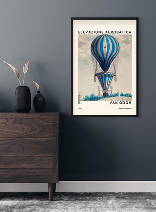 Framed Elevazione Aerobatica Plakat featuring a vintage hot air balloon, displayed above a modern wooden dresser.