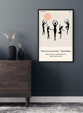 Framed poster of Matisse-inspired dancers in black silhouettes with a pink circle, displayed above a dark wooden dresser.