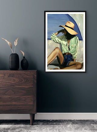 Framed "Colorful Dreamer" by Martina Karlsson on a dark wall above a wooden dresser with minimalist decor.