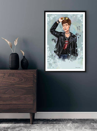 Framed Slick artwork by Martina Karlsson displayed on a dark wall above a wooden dresser with vases.