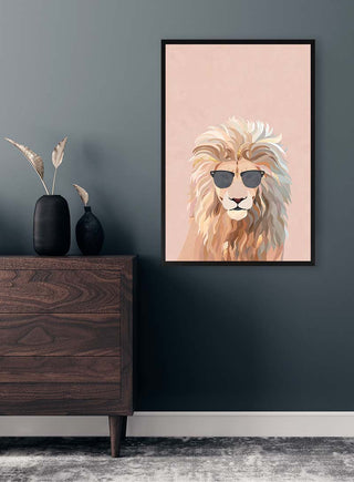 Framed art of a lion wearing sunglasses on a wall, perfect for adding cool style to any room.