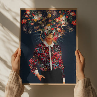 Hands holding "Your Head Was Full of Colours That Had No Names" print, showing a figure with vibrant floral imagery.