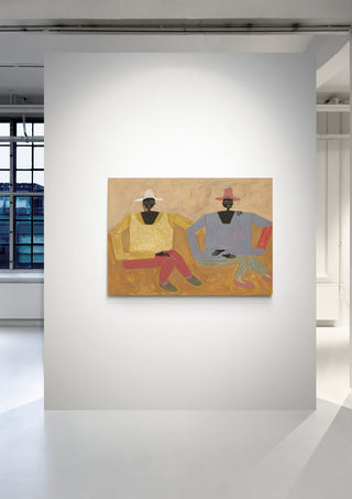 A large abstract painting of two seated figures displayed in a bright, modern gallery at Studio IMO.