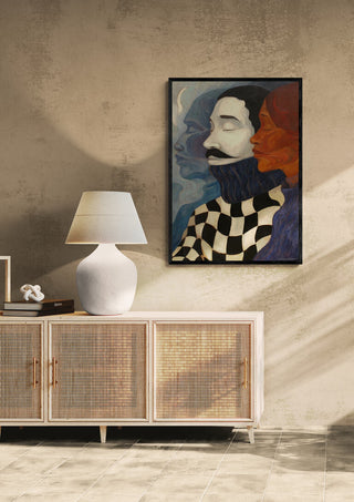 Framed "Mind Your Business - Martin Zen" artwork above sideboard with lamp in a modern, neutral-toned room.