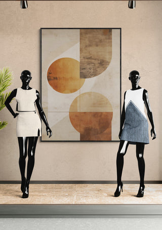 Two mannequins in modern dresses stand beside artwork with warm autumnal tones, showcasing Autumn Dream 01.
