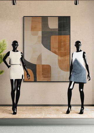 Two mannequins in modern dresses stand beside a framed abstract artwork titled Autumn Dream 02.