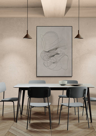 Minimalist dining room with a framed "Labyrinth of Dreams" abstract art hanging above a modern table and chairs.