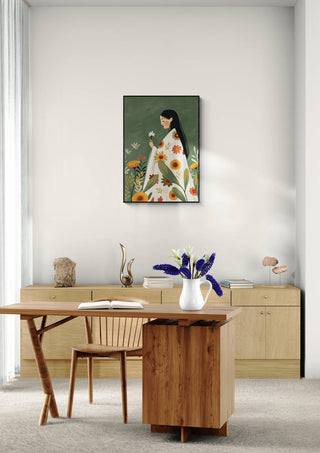 Framed "Petals of Tranquility" artwork by Elara Monet displayed in a modern, minimalist home office.