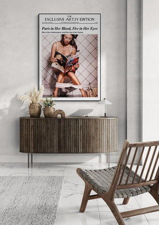 Framed "Come to Paris - Artsy Edition" poster above a modern sideboard in a stylish living room.