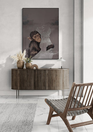 Framed artwork "Where Art Thou" by Gabriella Roberg displayed above a wooden sideboard in a modern room.