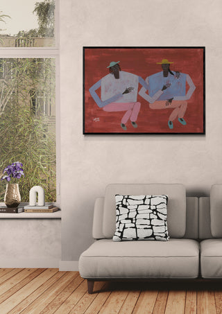 Framed "Better With You" artwork by Studio IMO hanging above a modern sofa in a cozy living room.