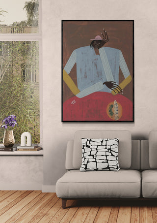 Framed "Clear My Head" artwork by Studio IMO displayed above a modern beige sofa in a bright living room.