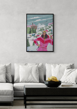 Framed art of a woman skiing in a festive winter landscape, perfect for Christmas home decor.
