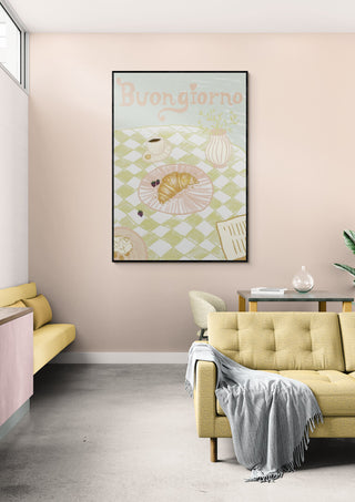 Framed "Buongiorno" poster featuring a breakfast scene, displayed in a modern living room with neutral decor.