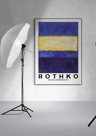 Rothko Yellow on Blue art print displayed in a minimalist studio setting with lighting equipment.