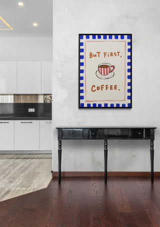 Framed "But First, Coffee" print displayed in a modern living space on Croissant Mon Amour product page.