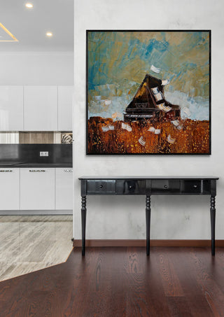 Piano painting by Justyna Kopania displayed above a black console table in a modern living space.